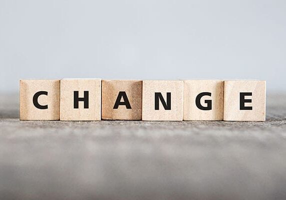 blocks lined up spelling the word change