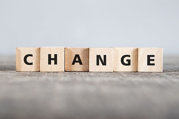 blocks lined up spelling the word change
